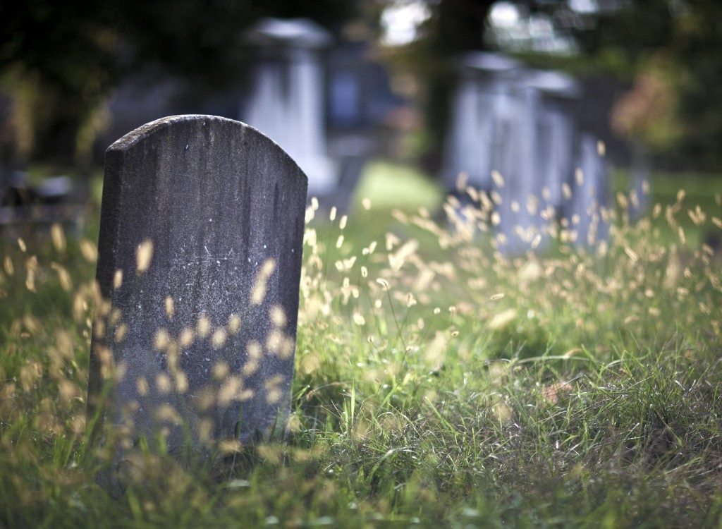 Gravestone with mold