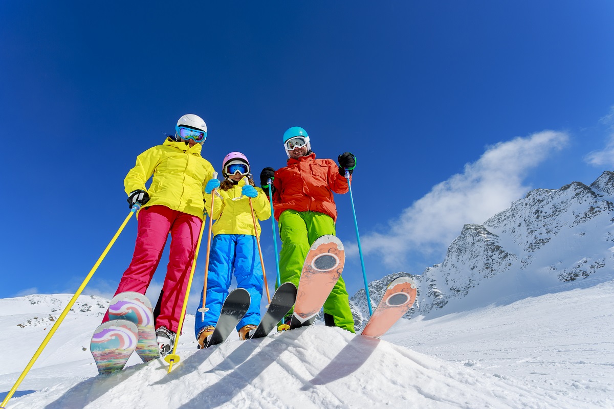 Family in a colorful ski gear