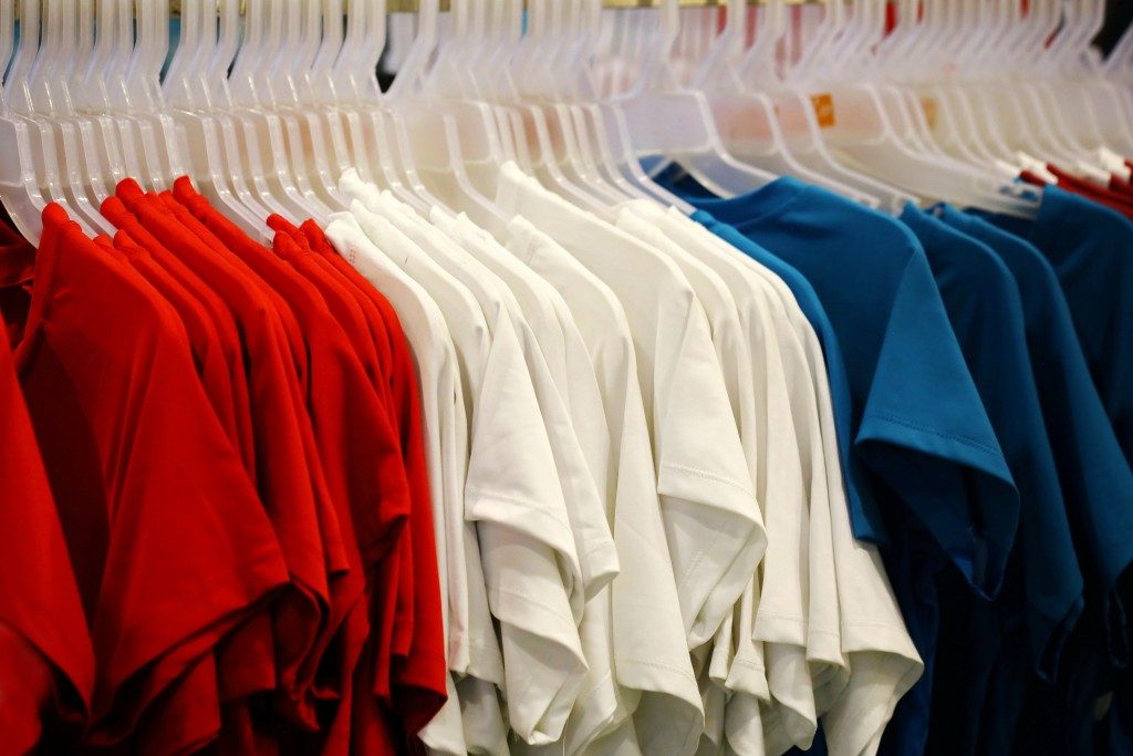 clothes lined up in a store