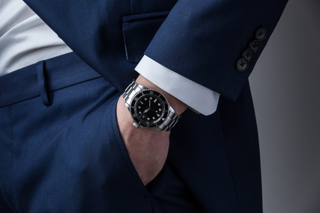 black and silver wrist watch