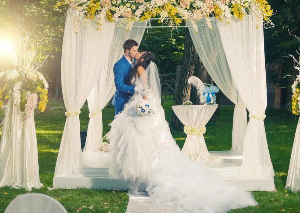 married couple on their oudoor wedding