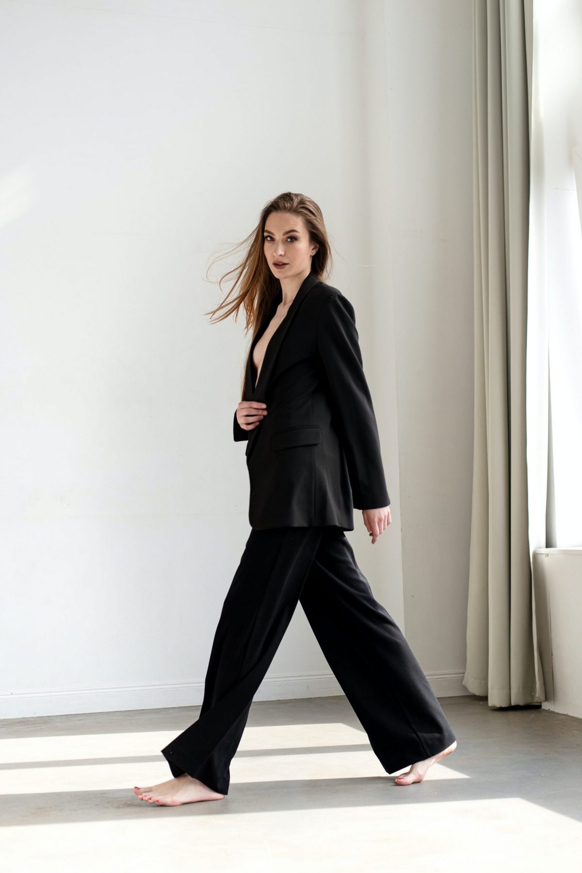 woman-in-black-pantsuit